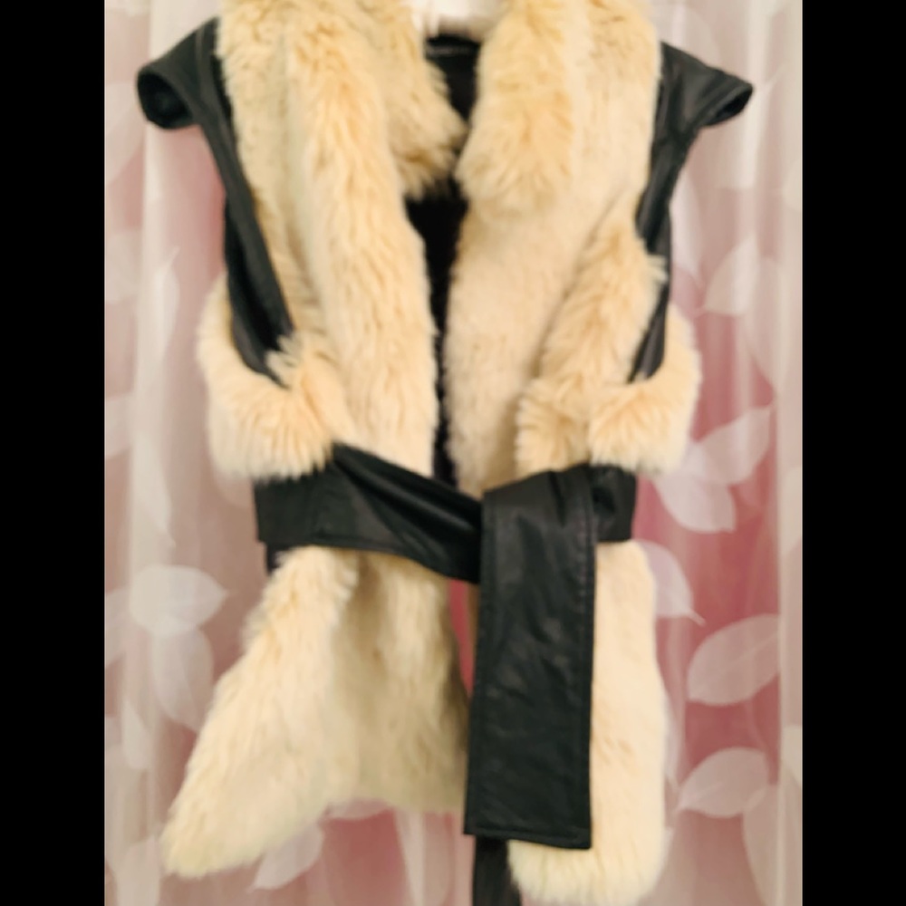 REDUCED!!!Make offer! Designer sample. Faux fur. Shorter in back. One of a kind.